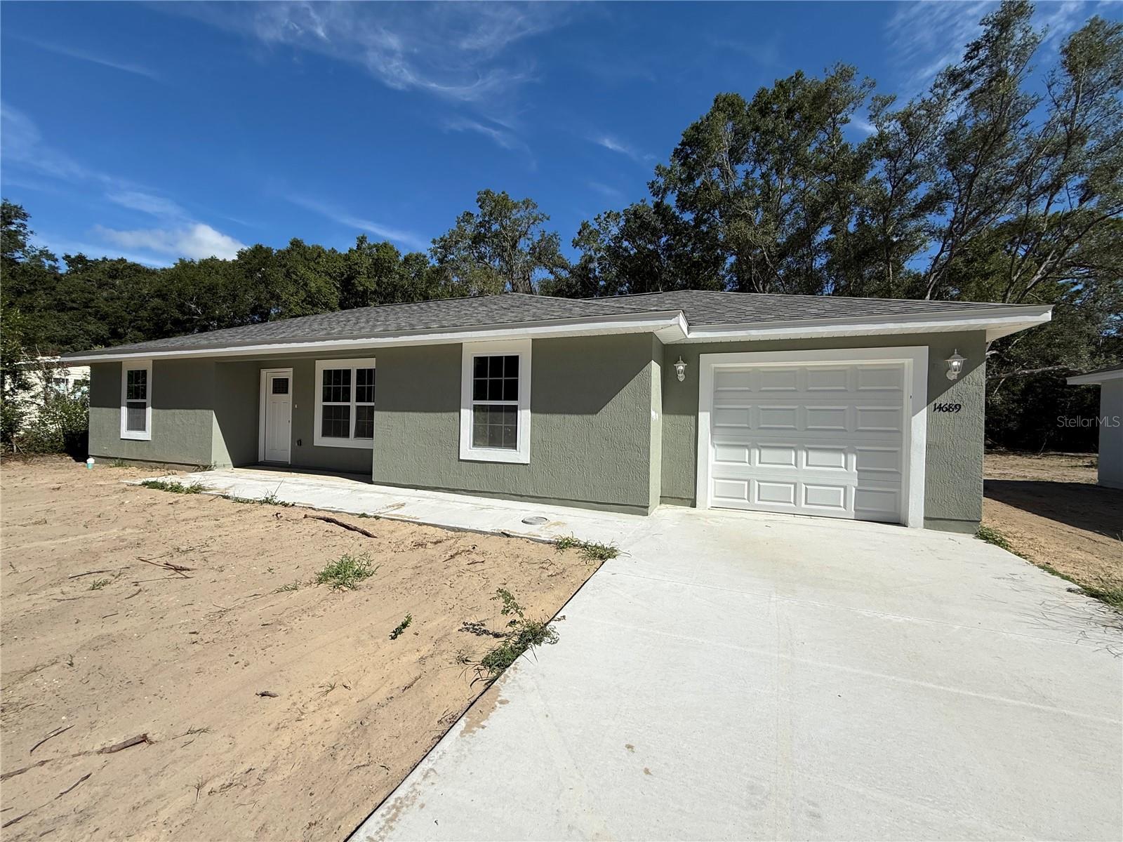Brand new spacious Stucco exterior frame home at an affordable price! Split plan three bedroom / two bathroom with attached finished one car garage that is equipped with a garage door opener. The kitchen offers Granite counter tops with upgraded cabinets. Stainless steel appliance package which includes the range, microwave, dishwasher and refrigerator. Tile in the bathrooms, Ceiling fans and more. Great location to shopping, activities, medical facilities and restaurants.