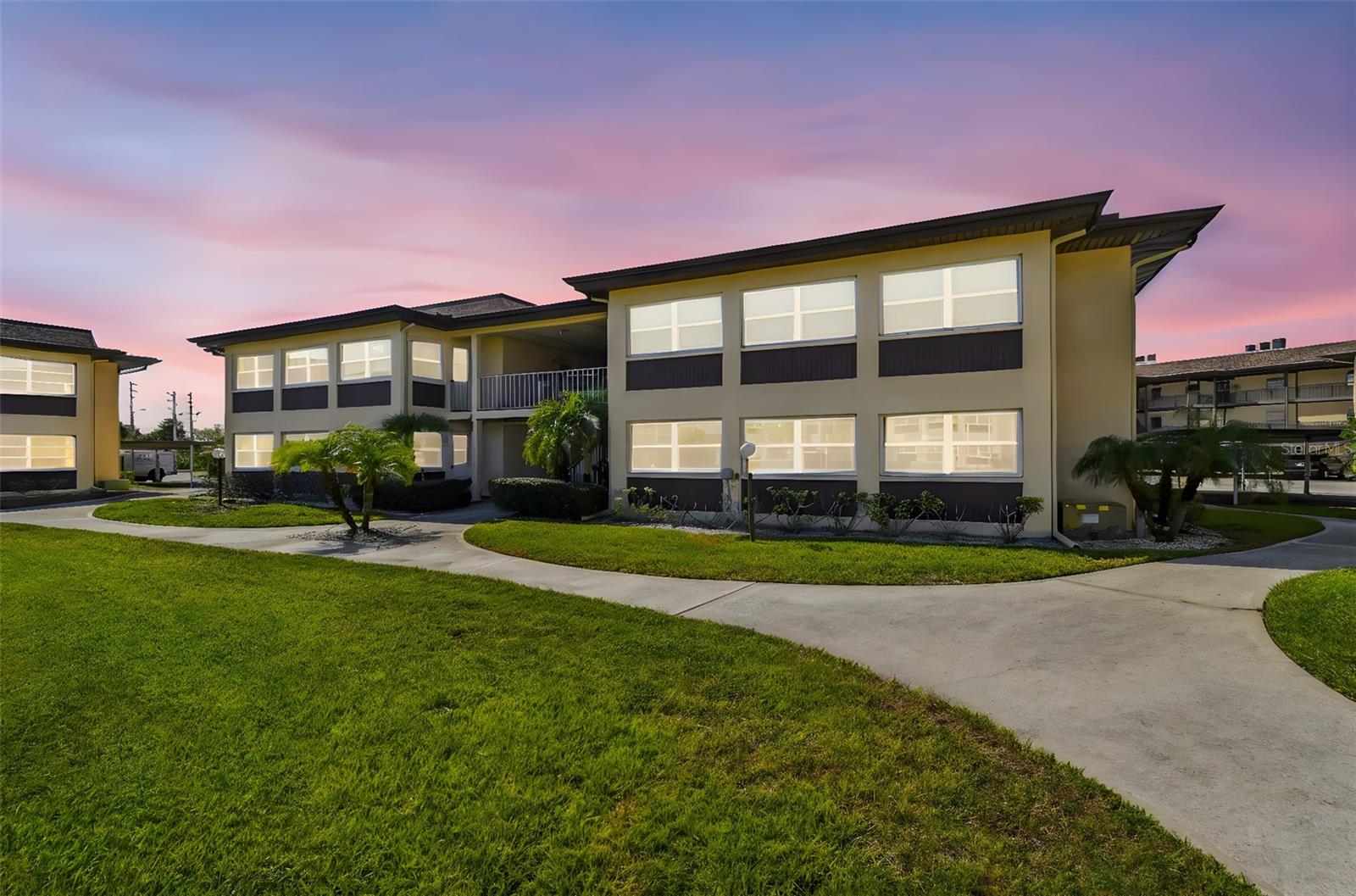 Stylish 2BR/2BA Condo located in Gulf Harbors. This beautifully updated unit offers a spacious layout with two full bathrooms, perfect for comfortable living or hosting guests. The kitchen shines with new appliances and modern finishes, while both bathrooms have been tastefully updated. Enjoy cool tile flooring throughout, a freshly painted interior, and peace of mind with new windows, A/C, and water heater. Ample closet space and an exterior storage closet add convenience, and a covered carport completes the package. Gulf Harbors residents can enjoy exclusive access to a private beach for just $200/year—featuring picnic tables, grills, and breathtaking views of the Gulf of Mexico and Anclote Key. Located minutes from downtown New Port Richey, you'll be close to dining, shopping, Sims Park, medical facilities, and Tampa International Airport. Whether you're seeking a full-time home or a seasonal escape, this move-in ready condo in an all-ages community offers the perfect blend of comfort, location, and lifestyle. Come experience Florida living at its best—schedule your showing today!