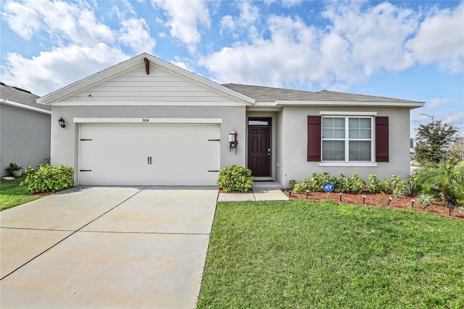 This charming 4-bedroom, 2-bath home in Haines City is available for rent and offers a spacious open floor plan, ideal for both relaxing and entertaining. The modern kitchen features plenty of cabinet space and a breakfast bar, perfect for meal prep and casual dining. The master suite includes an ensuite bath with dual sinks and a walk-in shower, providing a peaceful retreat. The additional bedrooms are generously sized, offering flexibility for family, guests, or a home office. This home also features solar panels, helping to reduce energy costs. Step outside to a private backyard, perfect for enjoying the Florida sunshine. Located in a quiet, friendly neighborhood, this home is just minutes from shopping, dining, and major roadways. A fantastic rental opportunity for comfortable, convenient living!