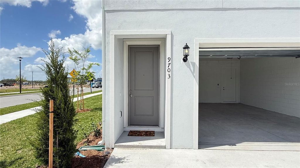 Photo of 9703 Undset Alley #9703, Orlando, FL 32827 (MLS # O6399941)