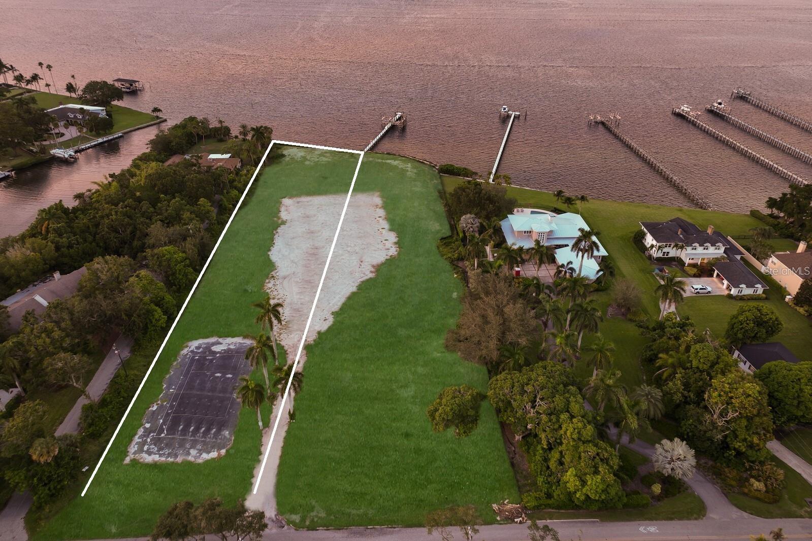RARE RIVERFRONT ESTATE LOT ON RIVERVIEW BLVD – OVER 1.8 ACRES WITH DEEP WATER GULF ACCESS! Opportunities like this truly come once in a lifetime. Situated directly on the majestic Manatee River, this extraordinary 1.8-acre estate lot offers deep water frontage with direct Gulf access, making it a dream come true for boating, fishing, and waterfront living. Located on one of the most sought-after stretches of Riverview Boulevard. Already elevated with over 12 feet of fill, the lot is build-ready and can easily accommodate even the most expansive custom home designs. Just 10 minutes from the white-sand beaches of Anna Maria Island and a short drive to downtown St. Pete and Sarasota’s vibrant cultural and culinary scene, this location offers the perfect balance of seclusion and convenience. Enjoy waterfront dining, explore scenic preserves, or ride your bike to Robinson Preserve, a 682-acre natural sanctuary with trails, kayak launches, and stunning outlooks. Estate-sized lots like this, with direct Gulf access and no HOA or deed restrictions, are nearly impossible to find—don’t miss your chance to build the riverfront lifestyle you’ve been waiting for.