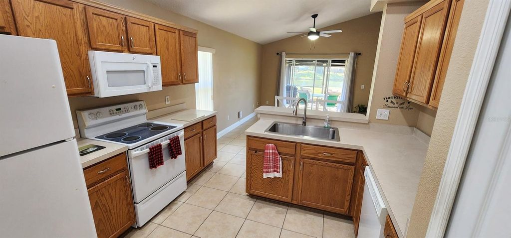 Photo of 2734 Eagle Canyon Drive S, Kissimmee, FL 34746 (MLS # O6371133)