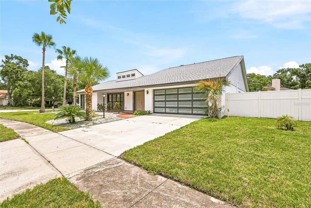 Photo of 8215 La Serena Drive, Tampa, FL 33614 (MLS # TB8536860)