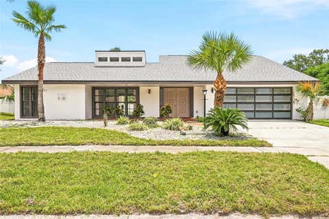 Photo of 8215 La Serena Drive, Tampa, FL 33614 (MLS # TB8536860)