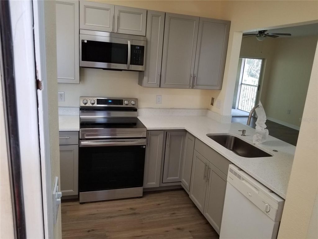 Photo of 6022 Portsdale Place #202, Riverview, FL 33578 (MLS # TB8499240)