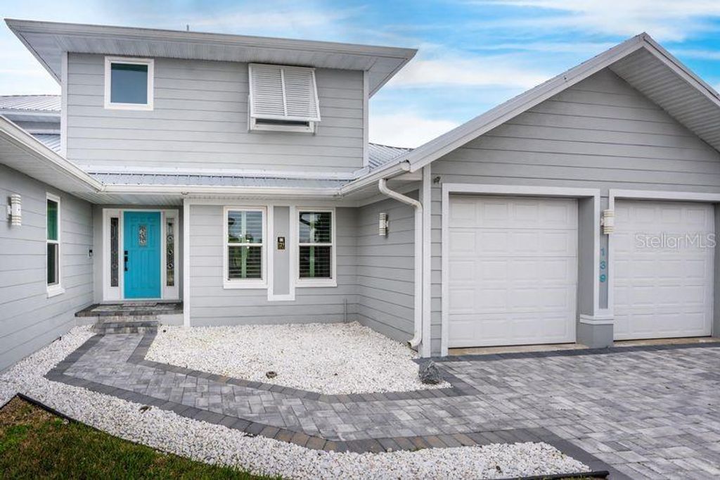 Photo of 139 Seville Place SW, Port Charlotte, FL 33952 (MLS # C7522197)