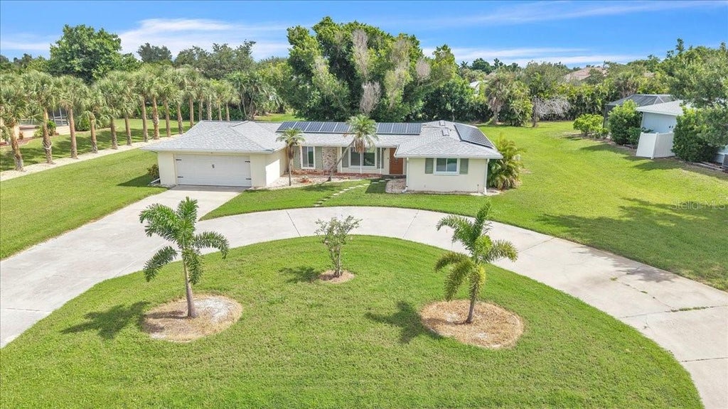 Photo of 310 Green Dolphin Drive, Placida, FL 33946 (MLS # C7530308)