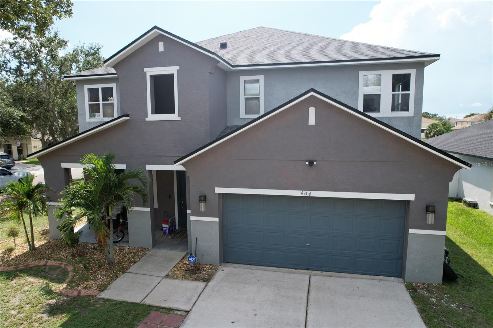 POOL HOME!! Welcome to this beautiful 5-bedroom, 3-bath home situated on a desirable corner lot. Featuring an open and spacious floor plan, this home offers plenty of room for comfortable living and entertaining. The large master suite includes a generous walk-in closet. Enjoy stylish laminate and tile flooring throughout, along with a completely fenced backyard for added privacy. Relax or entertain on the covered lanai overlooking the sparkling pool—perfect for gatherings with family and friends.