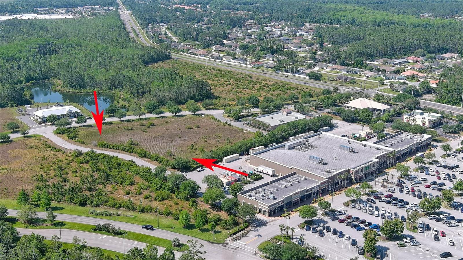 Excellent location in Town Center/Publix anchored center. Desirable busy, fast developing area is adjacent to Publix and just one lot from the new Dollar General store in this busy shopping center. Surrounding out parcels are home to PNC Bank, several restaurants, Dental Clinic, and more. This 1.45 acre parcel can be developed for medical offices, restaurants, car washes, etc.. Property is completely cleared, and all utilities are available to site. Excellent price point- Great investment property or build today as Town Center continues to grow with the expansion of the SR-100/Belle Terre corridor.