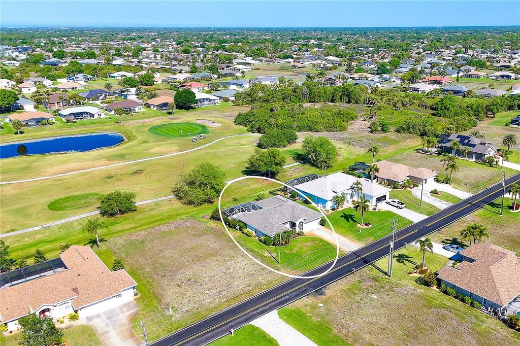 Photo of 920 Rotonda Circle, Rotonda West, FL 33947 (MLS # D6146791)