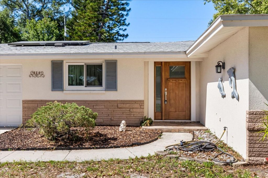 Photo of 620 Jacaranda Street, Dunedin, FL 34698 (MLS # TB8503844)