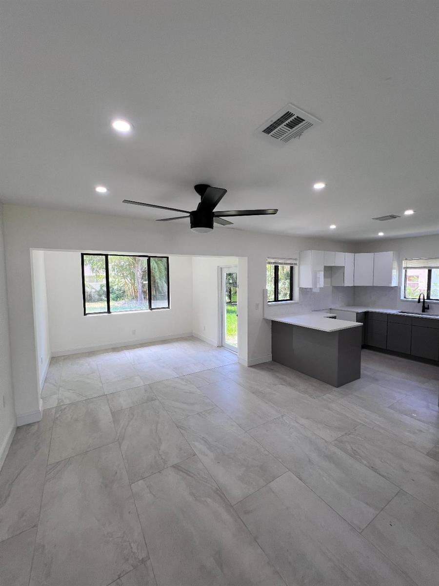 3/2 - all redone - new ac- exterior- hurricane windows -new kitchen, baths, doors, roof and new electric must see to appreciate