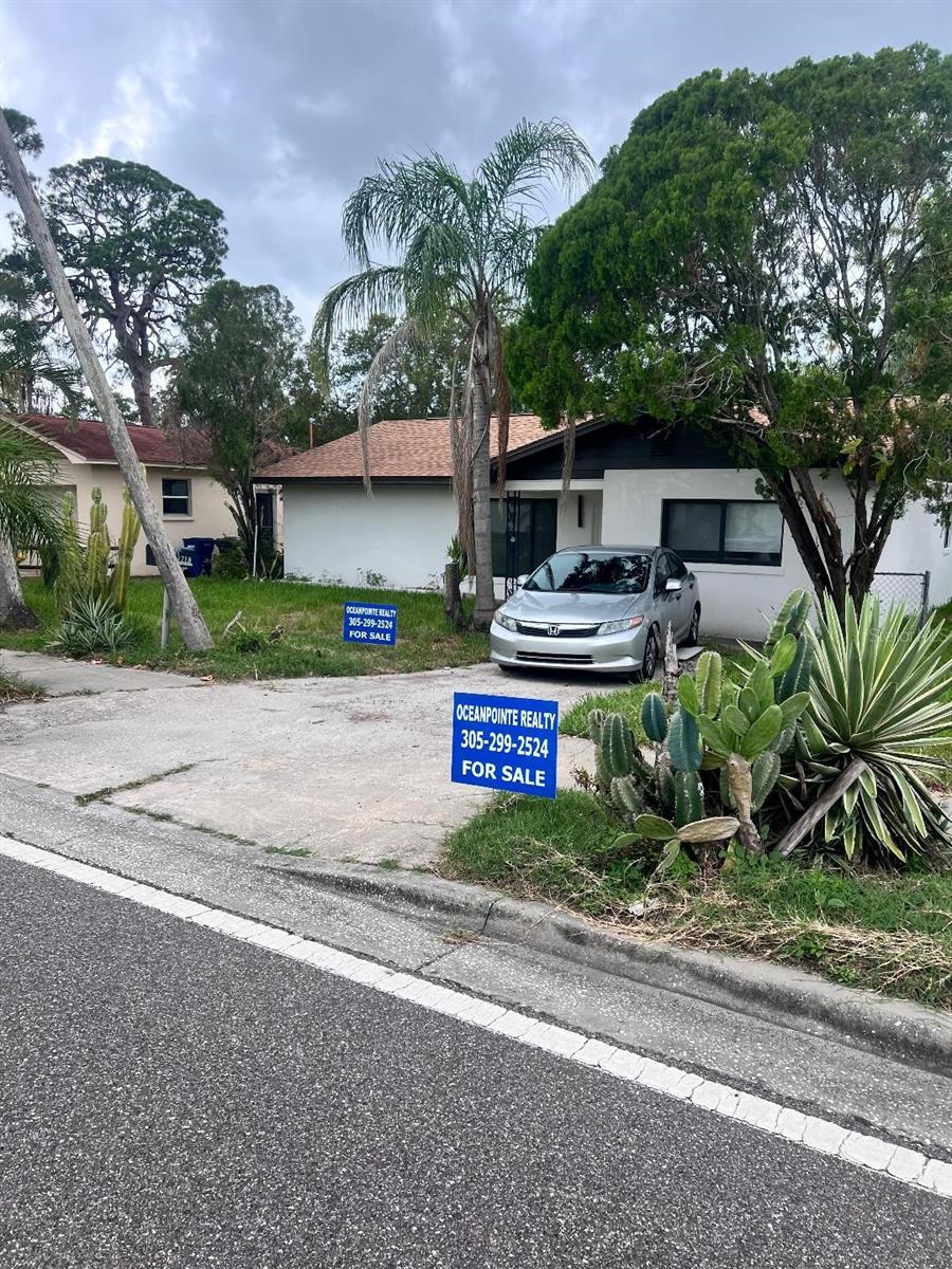 3/2 - all redone - new ac- exterior- hurricane windows -new kitchen, baths, doors, roof and new electric must see to appreciate