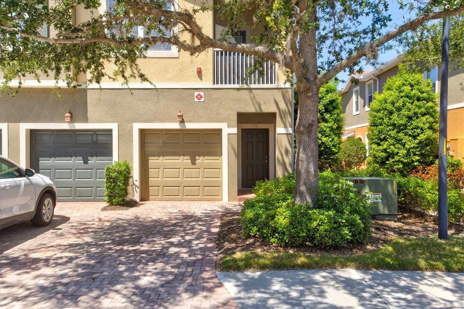 **** JUST REDUCED $25,000***** Welcome to your slice of paradise in South Sarasota! This charming condo in the gated community of Stonehaven offers the perfect blend of comfort, convenience, and coastal living. Step inside this inviting 2 BED, 2 BATH condo with a spacious layout and BRAND NEW LUXURY VINYL FLOORING. BRAND NEW HVAC SYSTEM INSTALLED JUNE '25! The well-appointed kitchen features sleek appliances and ample storage space, making meal preparation a breeze. Relax and unwind in the bright and airy living area, where large windows flood the space with natural light. Enjoy your PRIVATE SCREENED BALCONY, ideal for enjoying morning coffee or even sunset evenings. The master bedroom has a spacious en-suite bathroom and a generous WALK-IN CLOSET, providing plenty of storage. A second bedroom and bathroom offer versatility for guests or a home office. With the ATTACHED GARAGE, you'll have added convenience and security for your vehicle and storage needs. Plus, this GATED COMMUNITY offers peace of mind and a sense of exclusivity. Don't have time to swing by the beach? Instead, escape the everyday in the COMMUNITY POOL, where you can soak up the Florida sun and cool off all year round! And with MAINTENANCE-FREE living, you'll have more time to enjoy all that this area has to offer in the heart of Sarasota. Located about 15 minutes from SIESTA KEY BEACH, you'll have easy access to pristine white sands and crystal-clear waters as well as QUICK ACCESS TO I-75 to get you where you need to go quickly. Explore the local shops, restaurants, and entertainment options nearby, or venture further to discover all that Sarasota has to offer! Don't miss this opportunity to live the Florida lifestyle you've been dreaming of, schedule your showing today and make this condo your own oasis in paradise!