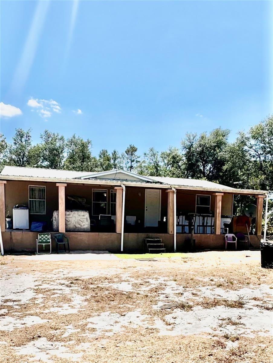 Back on the market!!!!!! This home is USDA approved, no down payment required!!!!! Escape the hustle and bustle of city life and enjoy peaceful country living on this picturesque 3.66-acre property in Frostproof. Whether looking for a move-in-ready home or a place to remodel and make your own, this property has everything. Enjoy your morning coffee on the spacious front porch with a view of wide-open spaces, fresh air, and a lifestyle that embraces simplicity and serenity. The home can be sold fully furnished, and yes, even the chickens are included. So bring your horse and don't miss this opportunity to enjoy the homestead lifestyle.