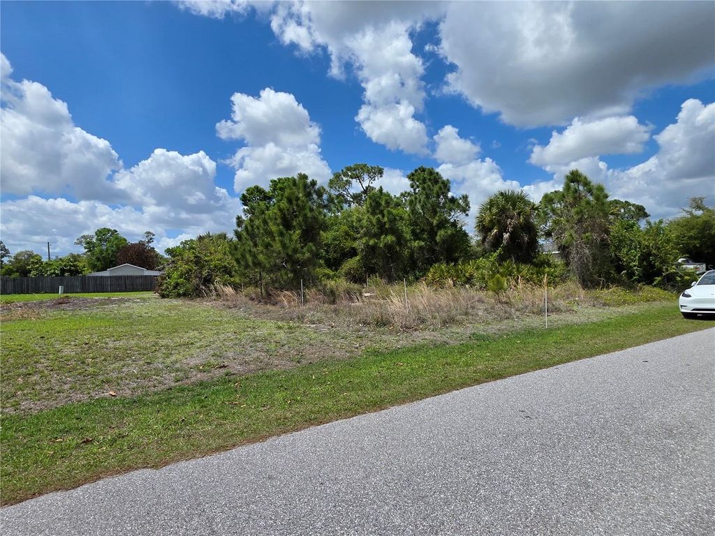 Photo of 215 Fletcher Street, Port Charlotte, FL 33954 (MLS # O6396179)