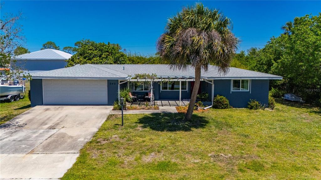 Photo of 540 Grove Avenue NW, Port Charlotte, FL 33952 (MLS # C7525314)