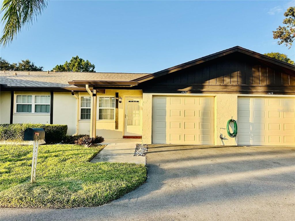 Photo of 1421 Heather Ridge Boulevard #1421, Dunedin, FL 34698 (MLS # TB8437628)