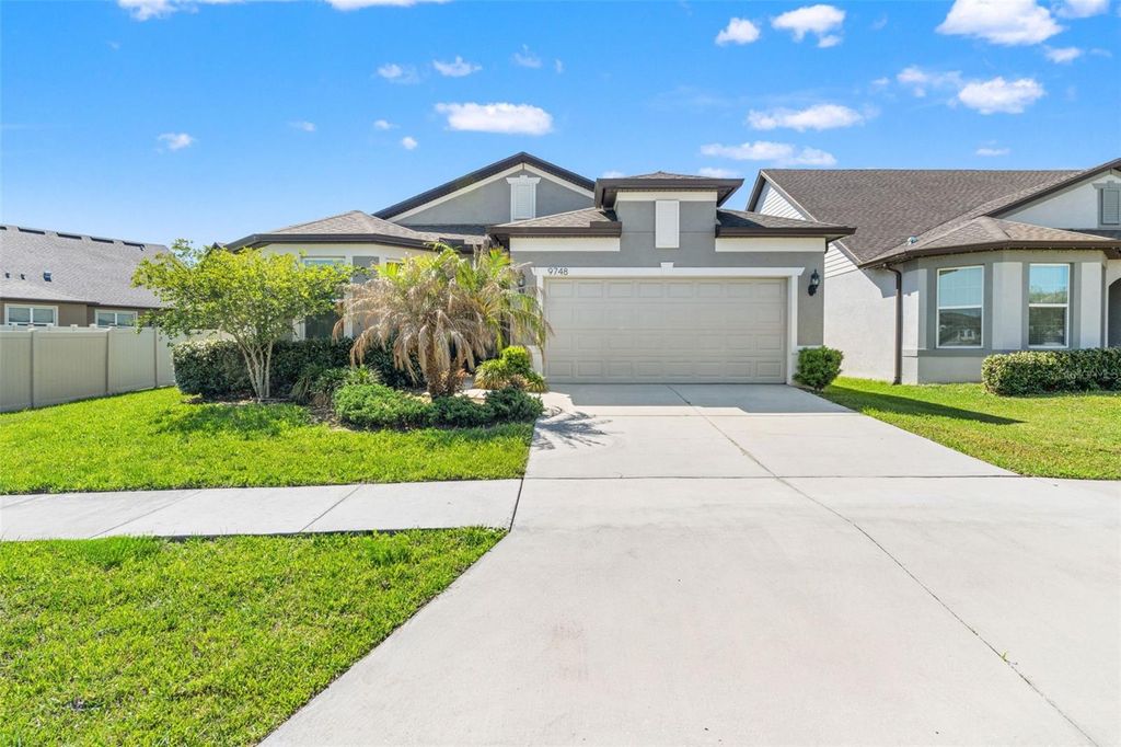 Photo of 9748 Ibis Grove Boulevard, Wesley Chapel, FL 33545 (MLS # TB8500732)