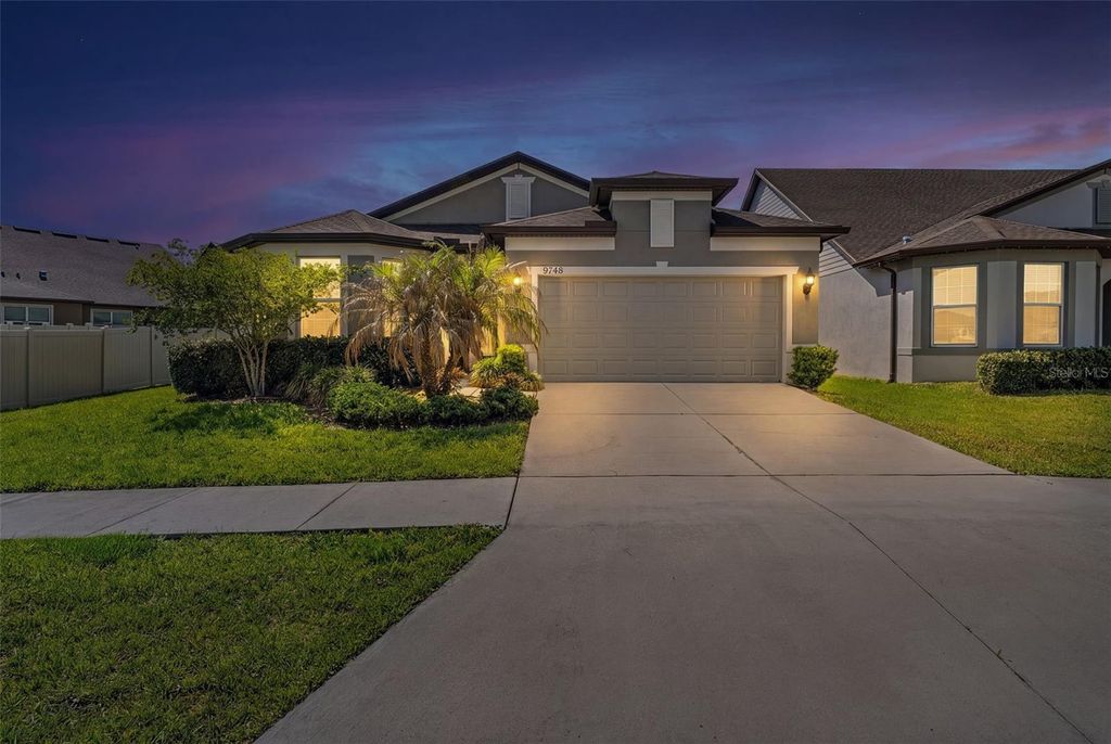 Photo of 9748 Ibis Grove Boulevard, Wesley Chapel, FL 33545 (MLS # TB8500732)