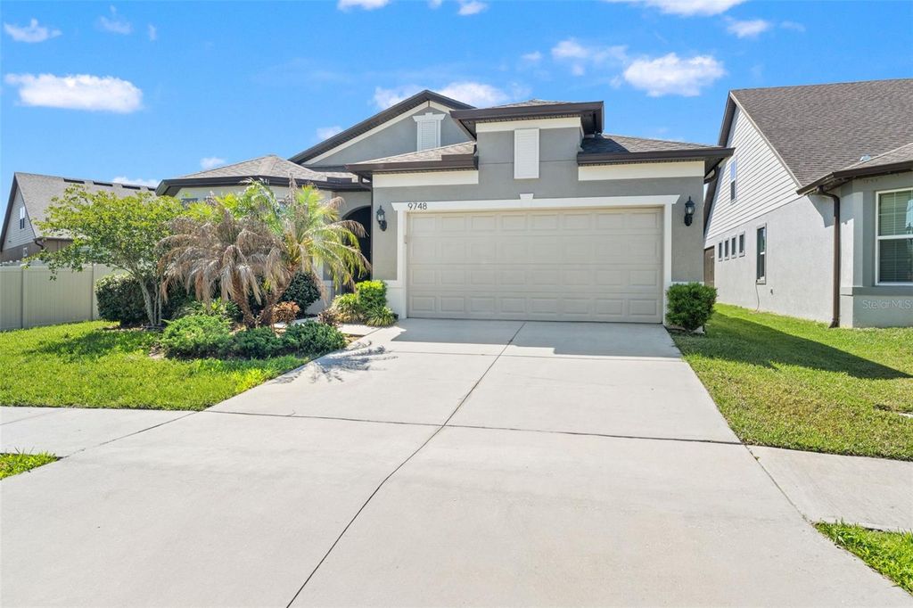 Photo of 9748 Ibis Grove Boulevard, Wesley Chapel, FL 33545 (MLS # TB8500732)
