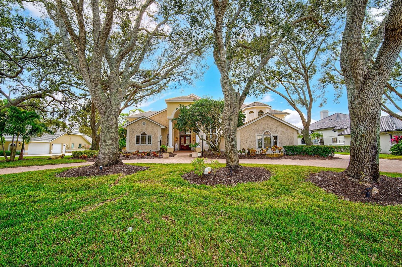 **EXPANSIVE, GOLF COURSE ESTATE with Private and Tranquil LAKE VIEW in THE MANORS at PRESTANCIA, a HIGHLY SOUGHT AFTER ENCLAVE** This sprawling residence (8,025 SF) on an oversized, 0.73 Acre Lot with its ideal, Southern Exposure overlooking the 12th fairway of the TPC Prestancia Stadium golf course, features 4 EN SUITE BEDROOMS, 6 FULL and 2 HALF BATHS, a Light and Bright Open Floorplan, Soaring Ceilings, Elevator, and Exceptional Craftsmanship throughout -- with premium finishes/materials including Mahogany, Marble, Coral Stone, Granite, Cypress, etc. The extraordinary outdoor space (2,362 SF) offers generous seating and gathering areas, outdoor kitchen, and an impressive Resort Style Heated pool with 2 Spas, bridge walkway, etc. within a colossal, screened lanai. This residence boasts wonderful curb appeal with its manicured landscape, Circular driveway and includes a 3-Car Garage. This Property is a MUST SEE! TPC PRESTANCIA is an Amenity-rich, Gated Community offering ease of access to I-75, area Beaches including #1-rated Siesta Beach, Shopping, Downtown Sarasota cultural venues, and all that Florida’s Gulf Coast Living has to offer. **PLEASE ENJOY viewing the 3D VIRTUAL TOUR and AERIAL VIDEO**