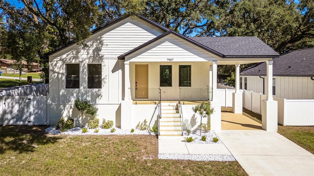 Photo of 7907 N Greenwood Avenue, Tampa, FL 33604 (MLS # O6443510)