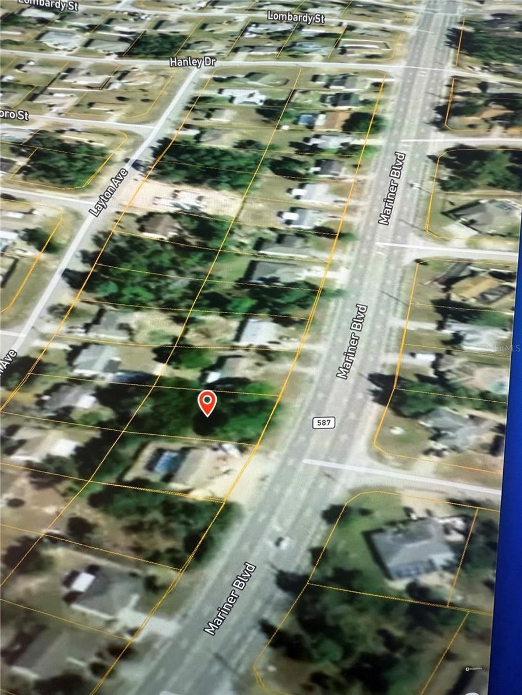 Photo of 6215 Mariner Boulevard, Spring Hill, FL 34609 (MLS # TB8341572)