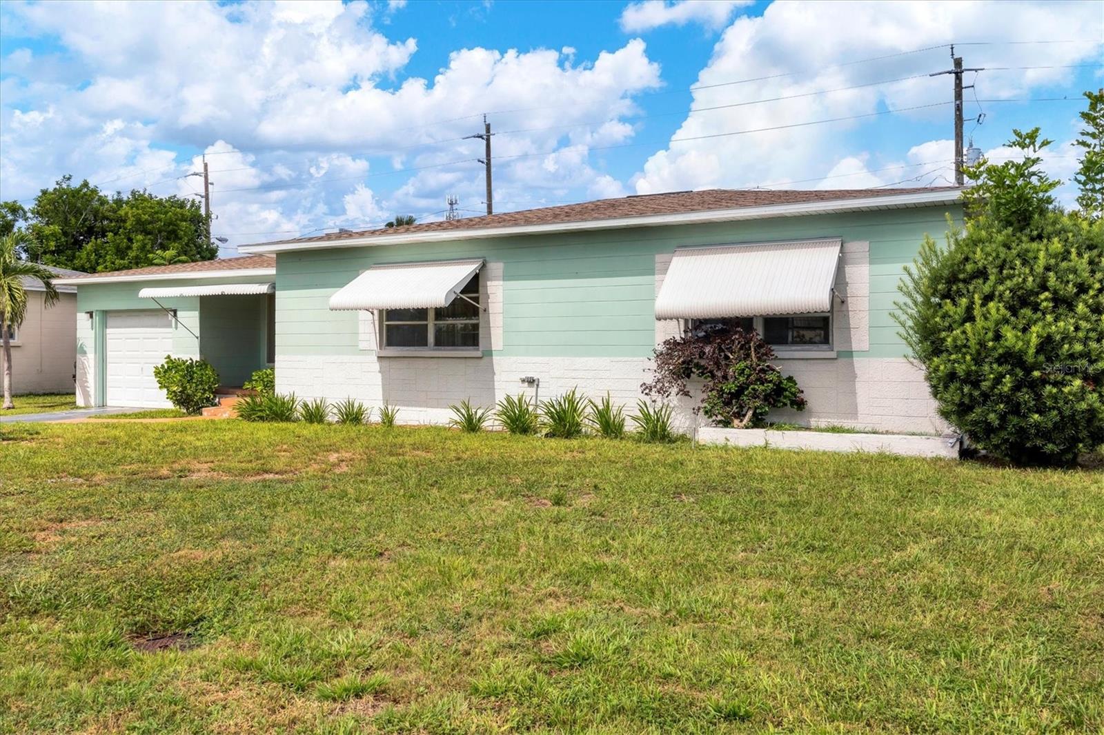 Discover the potential in this charming 2-bedroom, 2-bathroom + a den/sunroom single-family home located in the heart of Bradenton, Florida on a cauldesac street. Featuring a 1-car garage and No or Optional HOA, this property offers freedom and flexibility for homeowners or investors. While the interior awaits your personal touch and updates, major expenses are covered with a brand-new roof in 2025, Newer appliances in the kitchen, Interior Paint 2025, window screens replaced and the home was tented for termites and other bugs. This has a 1 year transferable warranty for the new owner. There is a large fenced backyard with mature trees and plants, room for a pool or a screened in patio. Other notable features are neutral tile throughout the entire home, no carpet, ceiling fans in all rooms, lots of natural light, a long driveway with room for additional cars and privacy. All of this is conveniently located minutes from beaches, shopping, and dining. Rental restrictions would be county/city restrictions only. Call the listing agent or your buyer agent to schedule a showing today. This is a great opportunity to create your next home or investment property!