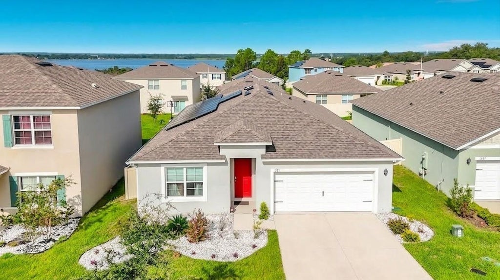 Photo of 1293 Tagliamento Lane, Haines City, FL 33844 (MLS # O6440548)