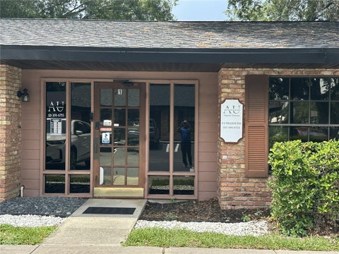 Photo of 318 N John Young Parkway #101, Kissimmee, FL 34741 (MLS # S5153636)