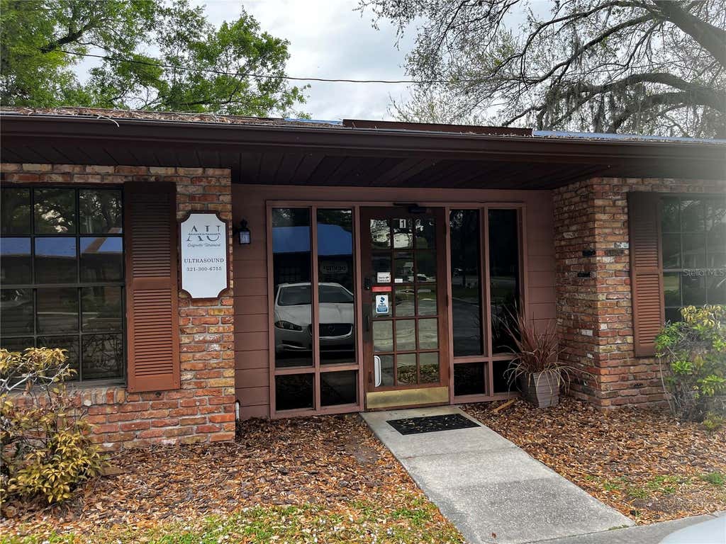 Photo of 318 N John Young Parkway #101, Kissimmee, FL 34741 (MLS # S5153636)