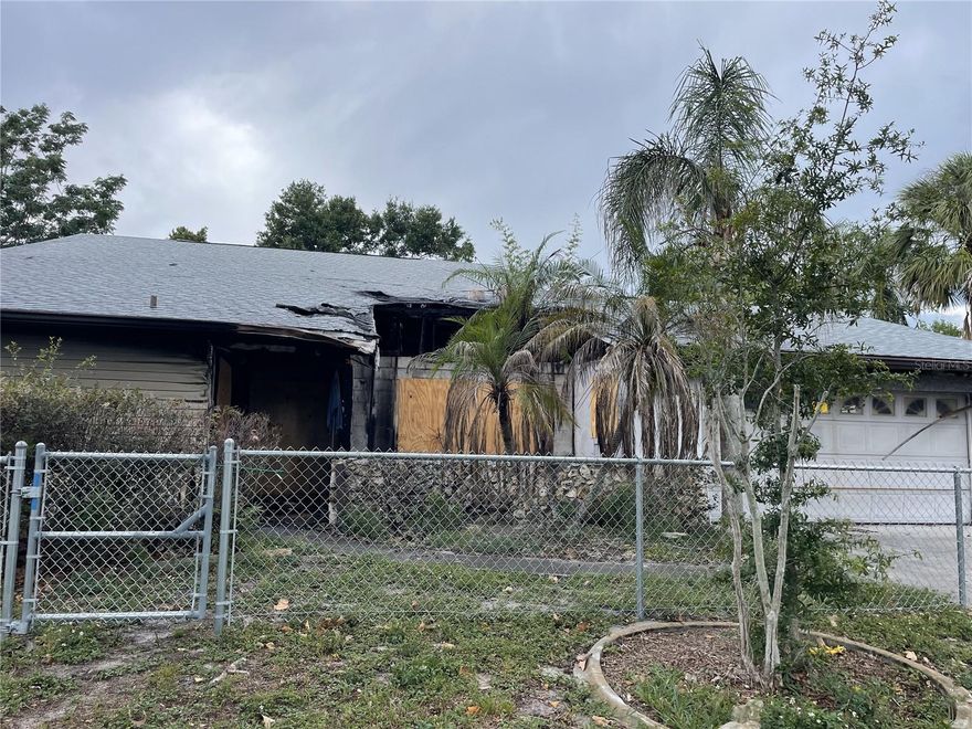 GREAT OPPORTUNITY! Large 5 bedroom home in the heart of Doc Phillips and close to the attractions. The home was damaged by fire which started on the front porch due to cigarette. Buyer can fixup and have a like-new home after completion. This home has a large lot, ingroud pool, 5 bedrooms, large master suite upstairs, attached 2 car garage and 3 full baths. Restore to make great equity and make your own! Home is being sold "AS IS"! WARNING! Due to fire, entering the property could be hazardous. Enter at your own risk!