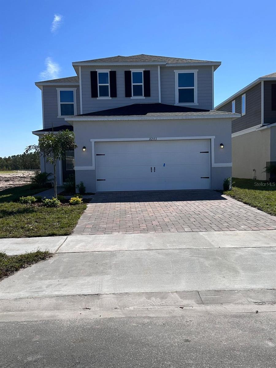 Photo of 16553 Brook Isle Way, Clermont, FL 34714 (MLS # O6436774)