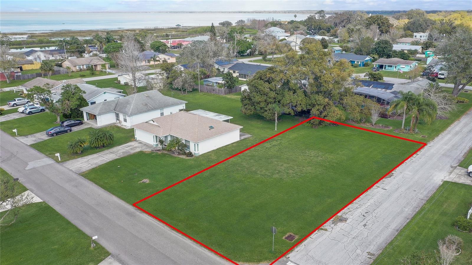 This prime 0.22-acre corner lot in the heart of Saint Cloud, Florida, offers an incredible opportunity to build your dream home. No HOA or Utilities. Situated just two blocks from the serene East Lake Toho and the vibrant downtown St. Cloud, you'll enjoy the perfect balance of peaceful living with convenient access to local amenities. The lot is high and dry, providing an ideal foundation for your custom-built home. With easy access from both the avenue and the side street, you'll love the flexibility of the location. Nestled in a fantastic neighborhood with well-maintained homes and lawns, this property boasts no HOA fees, allowing for more freedom in your design and construction plans. Plus, all necessary utilities are already in place and ready for connection, making this lot an even more attractive and hassle-free choice for your next project. Don’t miss out on this exceptional opportunity to own a piece of land in one of Saint Cloud’s most desirable areas!