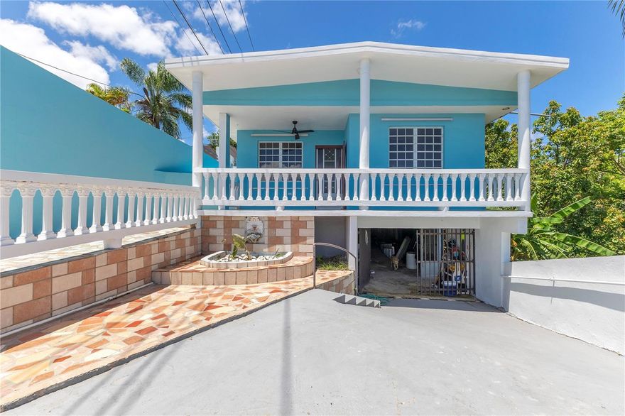 Tucked away in a quiet neighborhood of Río Grande, Rincón, yet only a short drive to everything, this property offers a blend of privacy and tropical living with much potential. Set on over an acre of land with lush, fruit-bearing trees, it provides space to enjoy nature while staying close to town.

The main home features 3 bedrooms and 2 bathrooms, including a private primary suite with its own bath and a balcony overlooking tropical landscaping. The kitchen and dining area flow together in an open layout, highlighted by a nice-sized island and ample pantry space, while the living room is set apart for added relaxation. A same-level laundry and access to a large storage space bring everyday convenience, and solar panels provide energy efficiency.

A detached “mother-in-law” apartment adds flexibility, offering 1 bedroom, 1 bathroom, a bright living room, and a kitchenette, perfect for hosting guests, extended family, or generating rental income.

With gated parking for up to 3 vehicles, you’ll enjoy both comfort and security. Just a short drive to downtown Rincón, its beaches, restaurants, and with quick access to Route 115, this property captures the best of island living with convenience and charm.

Other Feature with Potential:

An on-site structure, partially built with cinder block and tin roof, ready to be completed as a private casita, art studio, or workspace.

Summary:
Unit #1 (Main House): 3 BR / 2 BA – approx. 1,200 sq. ft.

Unit #2 (Casita): 1 BR / 1 BA – approx. 500 sq. ft.

Lot Size: Over 1 acre with fruit-bearing trees

?? Schedule your private showing today and explore the potential of this unique Rincón property!