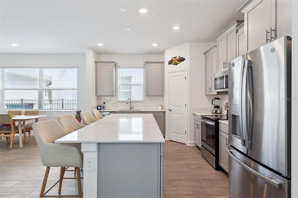 Photo of 9787 Introduction Way, Orlando, FL 32832 (MLS # O6398898)