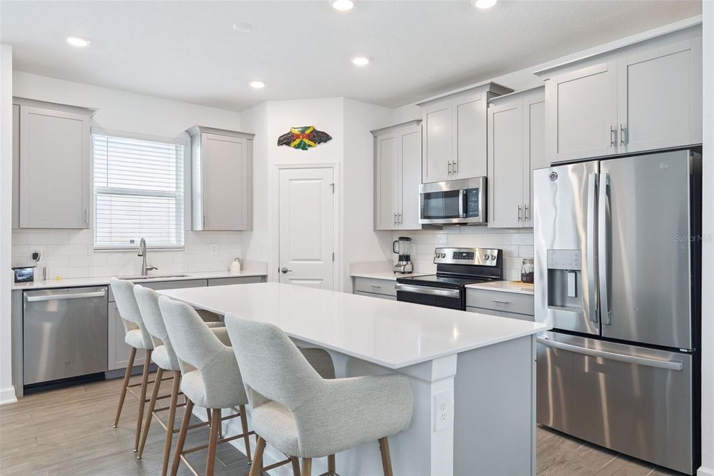 Photo of 9787 Introduction Way, Orlando, FL 32832 (MLS # O6398898)