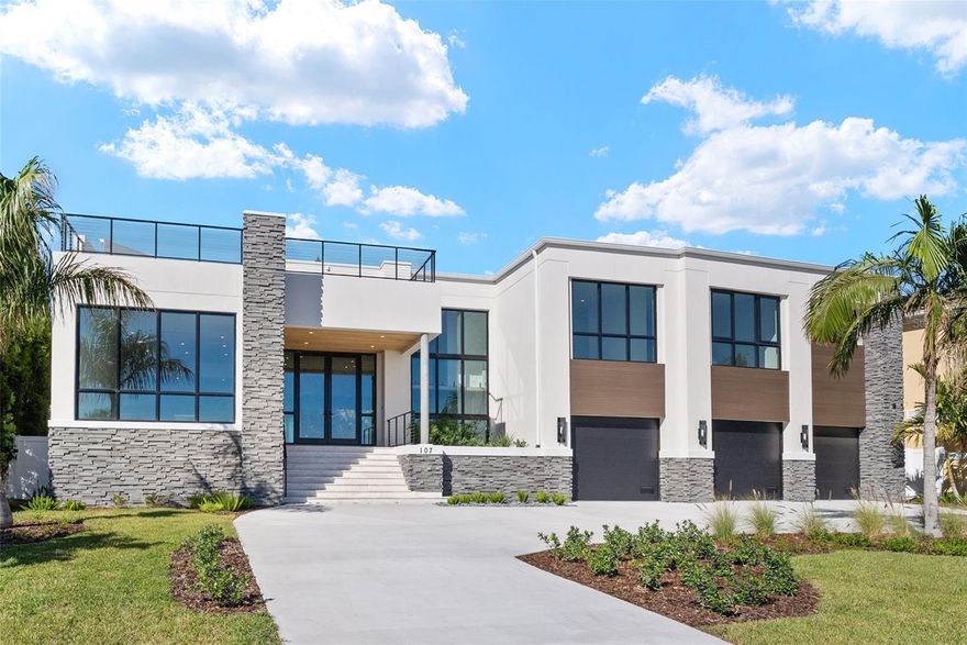 Under Construction. Open Bay views and unseen modern design on Davis Islands. This modern home is built for entertaining and ease of living by Forge Building Co. Enjoy spectacular open Bay views from much of the home with exceptional outdoor living spaces facing front and back. The home features 5 bedrooms, 5 and 2.5 baths, one room is a semi-detached guest suite, and an office, along with two outdoor kitchens: one on the back outdoor living space and one on the rooftop deck. Spectacular modern kitchen with built-in Gaggenau fridge and freezer, Gaggenau cooktop, and three Gaggenau wall ovens. The club room is entered thru pivoting doors and is the ultimate entertaining space. It includes a full wet bar, ice maker, and two built-in subzero 146 bottle wine coolers as well as plenty of room for pool table and has a double sided fireplace. The guest retreat off the Lanai offers a semi-connected bedroom for guests or family to enjoy. A second story "roof top oasis" will offer an amazing and unique space to relax or entertain. The 50'x15' pavered deck will include an outdoor kitchen complete with grill and fridge. Just off the roof top oasis, the semi-private Study with sliding glass doors offers a quiet place to relax or get some work done while enjoying endless open bay views. a bedroom completes the area. Spacious Master bedroom and bath with stunning views as well as private wet bar, private elevator access, sitting room, and fireplace. Separate Media room with fridges and plenty of space for any buildout you desire. Back porch will include an outdoor kitchen and overlook a beautiful pool and spa. Some of the appointments of the home include an elevator, 4 car tandem garage, impact-resistant window walls, almost all 2 story block construction, quartz and marble countertops thru out, built-out closets, and much more! Located on beautiful Davis Islands just across from the walking and bike path and just a short distance away from Davis Islands Village with many restaurants, shops, and bars. Bring your golf cart and enjoy the Island lifestyle with walking / biking paths, baseball fields, public tennis courts, public historic pool, two dog parks (one wet and one dry), a beach, public marina, and an airport. Located only minutes from Downtown Tampa, Water Street, Sparkman Wharf, and the Tampa Riverwalk, makes this neighborhood the most desired in South Tampa!