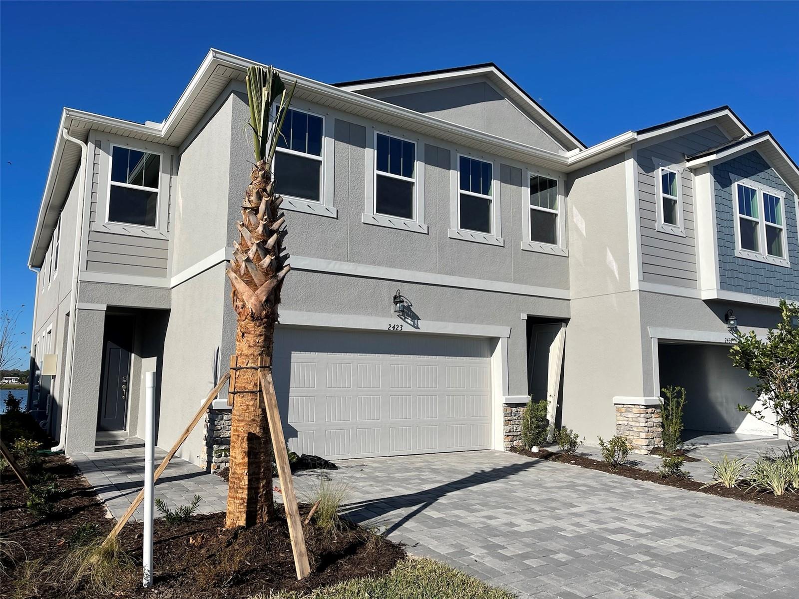 AVAILABLE September! Discover this luxury end-unit townhome with stunning lake views, located in the highly sought-after Parkview at Long Lake Ranch community.
Built by Mattamy Homes, this desirable Sebring model offers 3 spacious bedrooms, 2.5 baths, and a thoughtfully designed open floor plan. The gourmet kitchen is a showstopper, featuring 42” wood cabinetry, quartz countertops, and premium finishes. Enjoy outdoor living on the covered lanai with brick paver flooring, perfect for relaxing or entertaining. A water softener system is also included for added comfort.
Additional highlights:
Modern upgrades throughout
Top-rated schools nearby
Convenient location close to shopping, dining, hospitals, and major highways