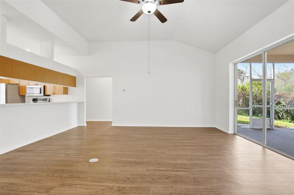 Photo of 28516 Hanging Moss Loop, Wesley Chapel, FL 33543 (MLS # O6372936)