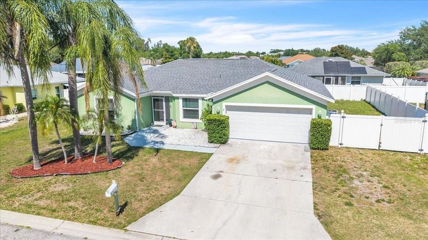 Located in the desirable Peaceful Pines community of Bradenton, this well-maintained home is framed by mature palm trees and attractive curb appeal. A generous driveway and fully fenced yard provide both convenience and privacy. The property has been thoughtfully updated over the years, offering true peace of mind with a hurricane-rated garage door (2016), impact-resistant insulated windows (2018),  A/C system (2018), and a brand-new roof completed in 2025. Residents of Peaceful Pines also enjoy the benefit of a low annual HOA fee of just $300 and is not in a Flood Zone. This charming 3-bedroom, 2-bath residence offers 1,331 square feet of comfortable living space under air, along with a spacious 2-car garage. A screened front entryway creates an inviting and practical welcome, perfect for enjoying Florida’s fresh air year-round. Inside, the open living and dining areas are enhanced by vaulted ceilings, creating a bright and airy atmosphere. Sliding glass doors extend the living space to the enclosed lanai, ideal for seamless indoor-outdoor living.  The kitchen continues the home’s open-concept design, featuring soaring vaulted ceilings and ample room for both daily living and entertaining. Modern finishes include sleek gray cabinetry, stainless steel appliances, a stylish mosaic tile backsplash, generous counter space for meal preparation, durable ceramic tile flooring, and a pantry closet for added storage. Convenient access to the lanai enhances both flow and functionality. The home offers generously sized bedrooms, with the primary suite serving as a private retreat complete with a walk-in closet and en-suite bathroom. Two guest bedrooms, located on the opposite side of the home, feature built-in closets and share a full guest bath. Completing the property is a spacious 22x22 attached garage providing ample parking and storage, along with a convenient laundry area and direct access through the kitchen hallway. The enclosed lanai overlooks a nicely sized backyard highlighted by a mature mango tree, providing a peaceful setting for relaxation, gardening, or outdoor entertaining. Conveniently located near shopping, dining, parks, golf, and beautiful Gulf beaches, with easy access to downtown Bradenton, Lakewood Ranch, and I-75.
**PLEASE ENJOY THE 3D INTERACTIVE VIRTUAL TOUR ASSOCIATED WITH THIS LISTING**