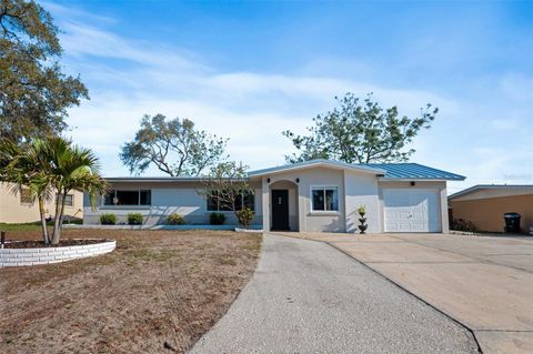 Photo of 1106 Connecticut Road, Tarpon Springs, FL 34689 (MLS # W7884099)