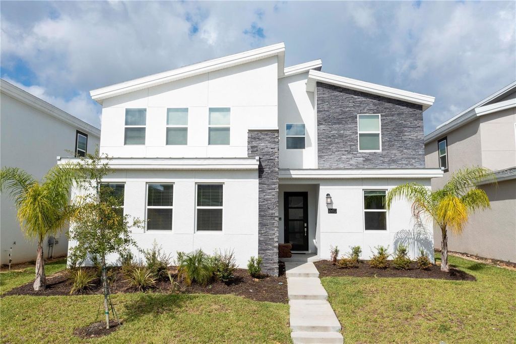 Photo of 740 Drop Shot Drive, Davenport, FL 33896 (MLS # O6397094)
