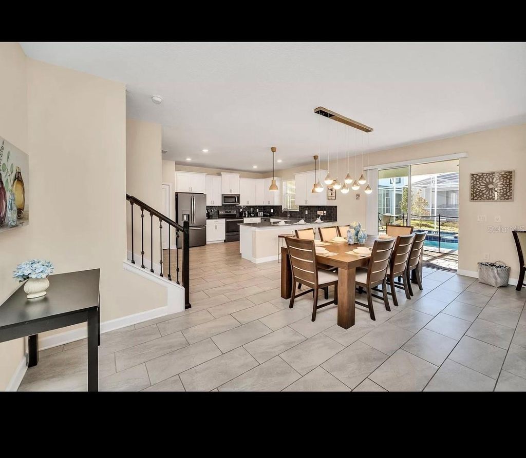 Photo of 740 Drop Shot Drive, Davenport, FL 33896 (MLS # O6397094)