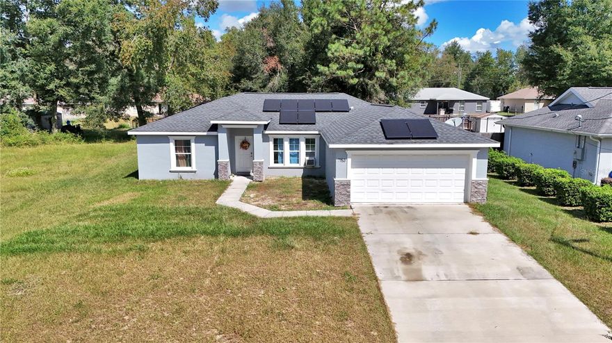 Welcome to this beautiful 3 bedroom, 2 bathroom home located in the desirable Sunny Skies community of Belleview. Built in 2020 with solid concrete block and stucco construction, this residence offers nearly 1,700 sq. ft. of living space on a spacious ¼-acre lot. With no HOA fees and no CDDs, this home combines comfort, value, and freedom of ownership.

Inside, you’ll find granite countertops throughout the kitchen, bathrooms, and laundry room, paired with elegant dark wood cabinetry that provides an abundance of storage. The kitchen is equipped with stainless steel appliances and flows seamlessly into the main living areas, creating a perfect space for entertaining. The primary suite features a double vanity, a modern tile shower, and a generous walk-in closet. Both bathrooms boast stylish tile showers, giving the home a clean and modern feel.

Additional highlights include a two-car garage, plenty of laundry room storage, and an open floor plan designed for today’s lifestyle. Conveniently located just off US-441/27, you’ll enjoy easy access to shopping, dining, medical facilities, and golf. This property is also one of the lowest price/square-foot homes in the area—and the seller is motivated!

Don’t miss the opportunity to make this beautiful home yours — call today to schedule your private showing!