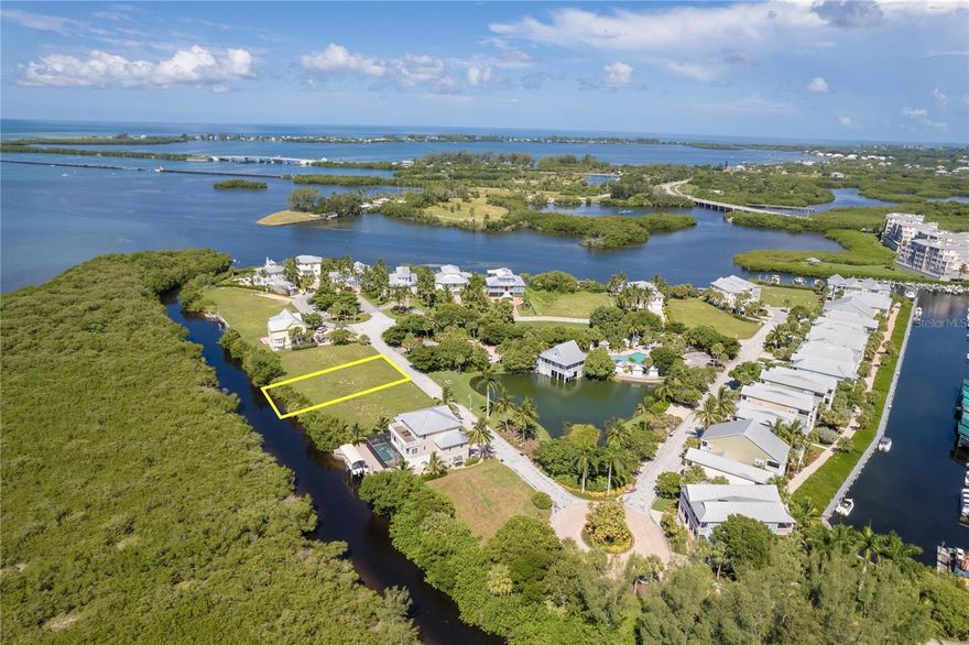 Prime Waterfront Lot with Direct Access to the Intercoastal & Gulf of Mexico. If you're a boater, this is the perfect spot to build your dream home! Just 1 minute from the Intercoastal and a short ride to the Boca Grande Causeway and the Gulf of Mexico, this canal-front lot offers unbeatable convenience. Located in the prestigious, gated Anglers Club community, you'll enjoy southern exposure and breathtaking views of protected preservation land. This rare find is nestled among luxury homes and provides the ideal canvas to create your own waterfront masterpiece. Community amenities include a heated lagoon-style pool, clubhouse, fire pit, and a dock with water and electric for your boat. Several marinas are nearby, and you'll be just minutes from top-tier golf courses like the Tom Fazio Signature Coral Creek Club. Living here means easy access to pristine beaches like Boca Grande, Stump Pass, and Englewood. With endless opportunities for boating and fishing right at your doorstep, this is your chance to embrace the ultimate coastal lifestyle. Don’t miss this once-in-a-lifetime opportunity to own a piece of paradise!