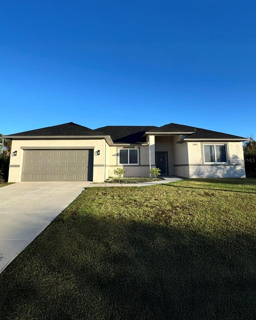 Photo of 10153 Wildcat Street, Port Charlotte, FL 33981 (MLS # O6345475)
