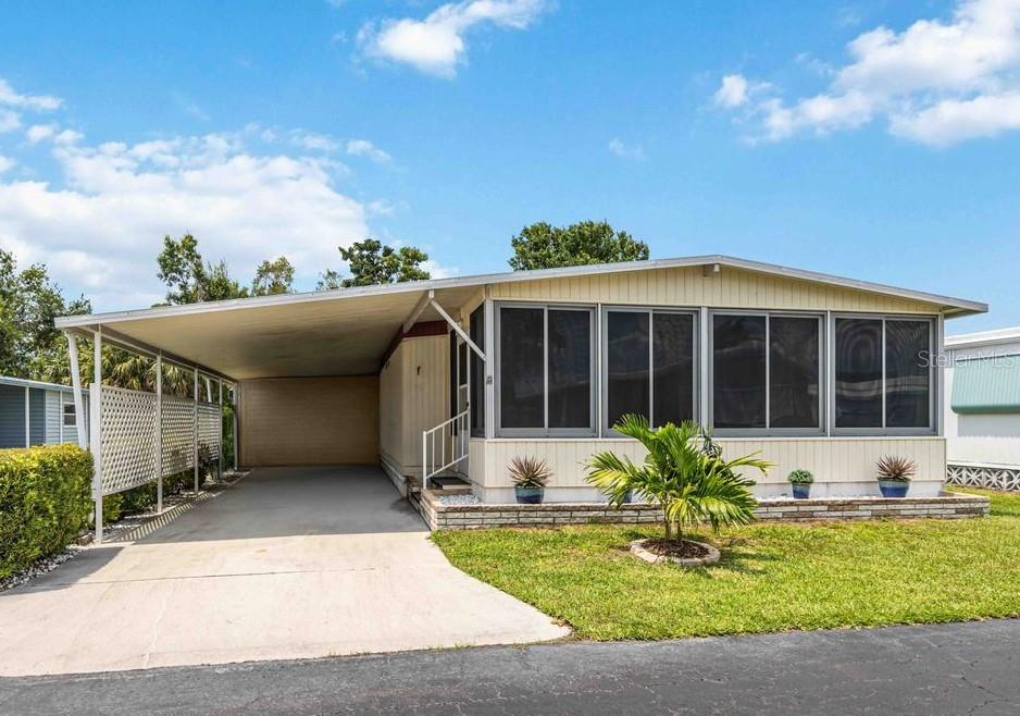 YOUR PERFECT FLORIDA RETREAT AWAITS.... Imagine spending your winter days in a swimming pool or in the warm waters and beautiful sands of Florida Gulf Coast beaches. This pristine 2 Bed, 2 Bath home located in the Arbors Mobile Park has been meticulously maintained and has many upgrades and extras. Open plan kitchen has dining area and built-in china cabinet. The master bedroom is ensuite and boosts a king sized bed and 3 closets. The living room opens to a large, enclosed florida room with lots of additional dining space for entertaining or just enjoying your morning coffee, evening cocktails, and includes a portable AC unit. Home is being sold turnkey furnished; bright and beautiful, with new furnishings in 2021 and 2022 including upgrades to HVAC with air purifier UV light, new electric panel, vapor barrier and subflooring, interior flooring, roof coated and sealed. Just pack your clothes and move right in! The large attached storage has lots of cabinetry, washer, dryer, work bench, manual and power tools, gas grill, compressor, 2 bicycles, golf clubs, plus EVERYTHING for you beach escape including chairs, umbrella, coolers, towels, floats and more, more, more! There is also a brand new unopened ENERGY STORM 4100 Lifan Power USA Generator. EZGO TXTE Golf Cart with GCO Custom Package, LED lights and newer batteries available at Seller's discretion. The Arbors Park is a 55+ Co-op community with low HOA fee that includes cable, internet, water, trash and grounds maintenance. Amenities include clubhouse, heated community pool, shuffleboard, billiards, exercise equipment, picnic area and area for RV and Boat parking. Located close to shopping, dining, hospital, Nokomis beach and minutes to Blackburn Point Park and Casey Key. So many ways to relax and spend your sun-filled days. Such an outstanding value-you just have to see to believe. Don't miss out on your opportunity to purchase your piece of paradise! Schedule your private showing today.