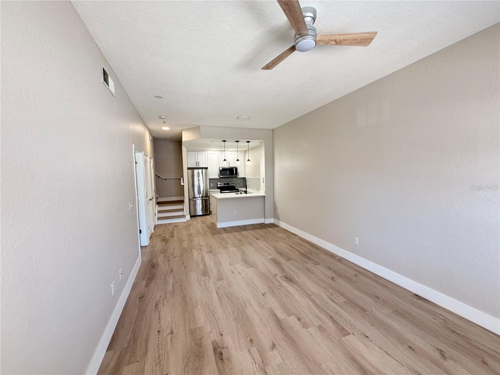 Photo of 2200 San Vittorino Circle #104, Kissimmee, FL 34741 (MLS # O6453529)